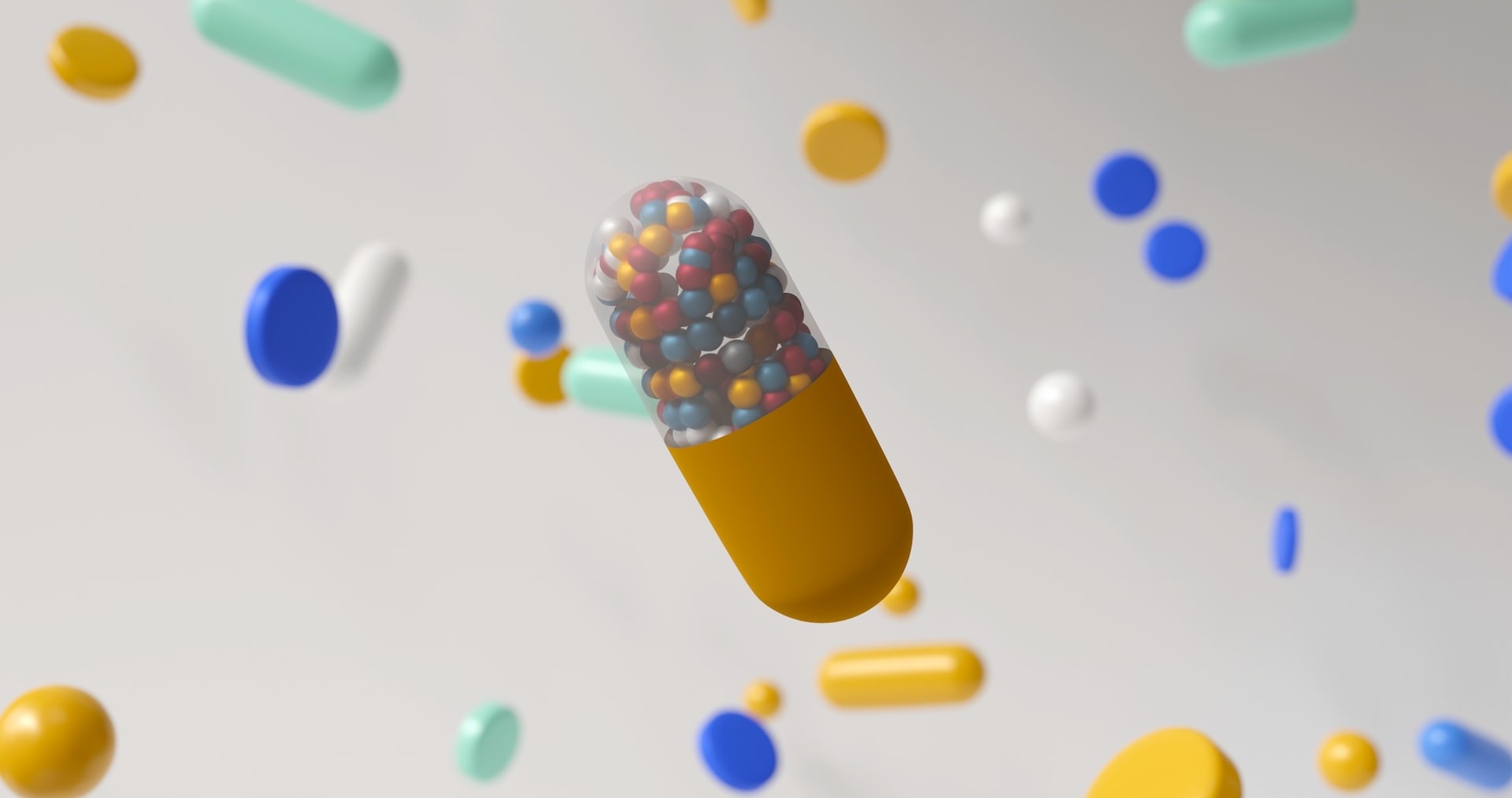 3d render of pills of various shapes and sizes
