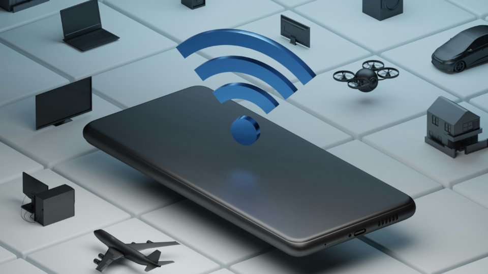 Wifi symbol above a phone surrounded by icons of other Internet of Things devices