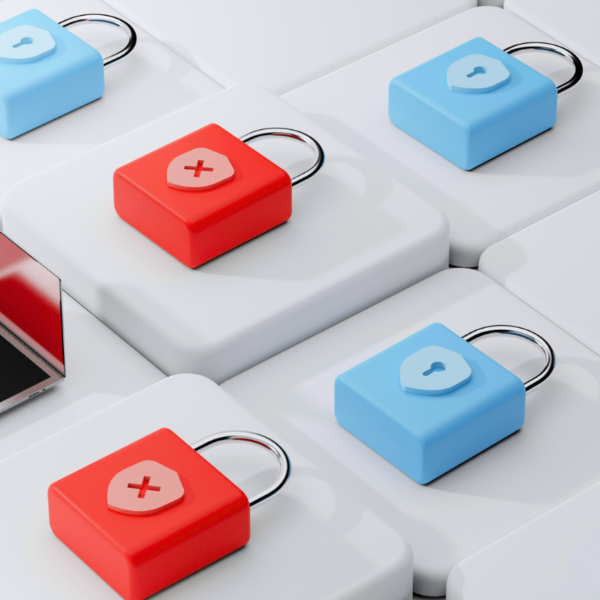 Locks that have been broken into next to computers to signify a hacked website.