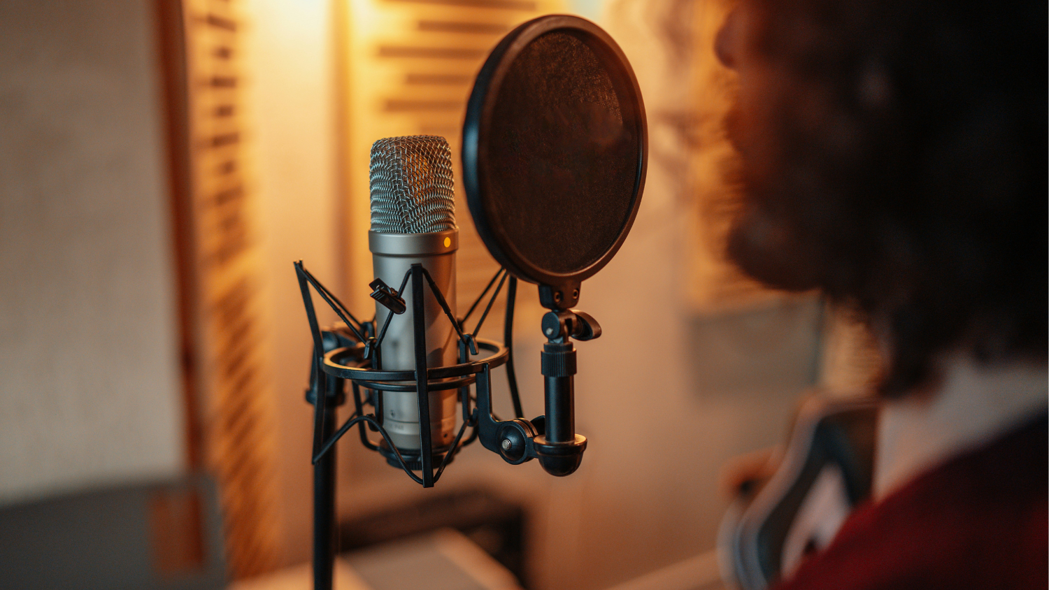 Voice actor at microphone