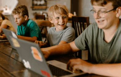 Children using laptops
