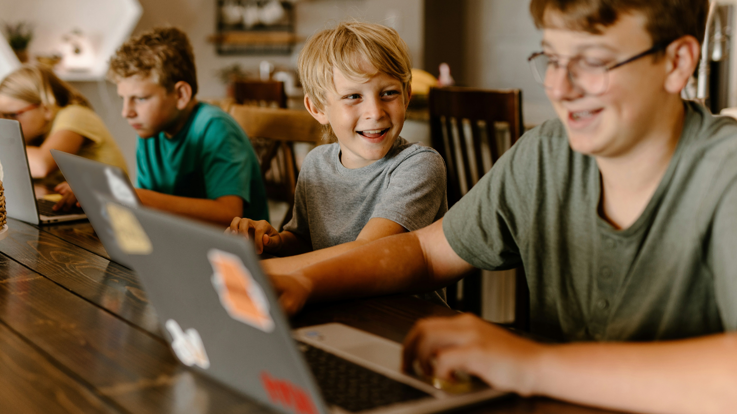 Children using laptops