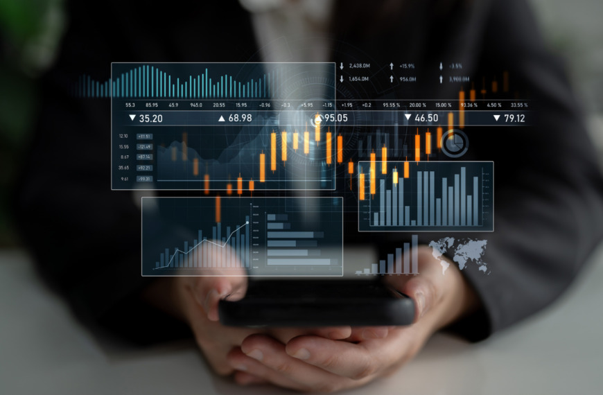 Transparent graphs displayed over a person holding their cell phone.