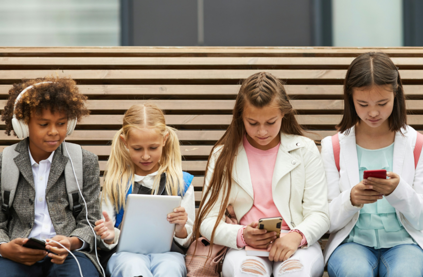 Young children using tech devices