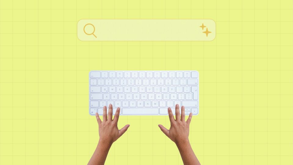Illustration of hands typing on a keyboard beneath a search bar with a magnifying glass icon and AI sparkles.